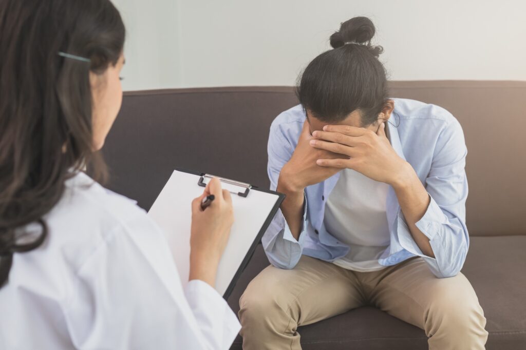 Asian,Young,Man,,Male,Has,Mental,Symptoms,Which,Must,Have